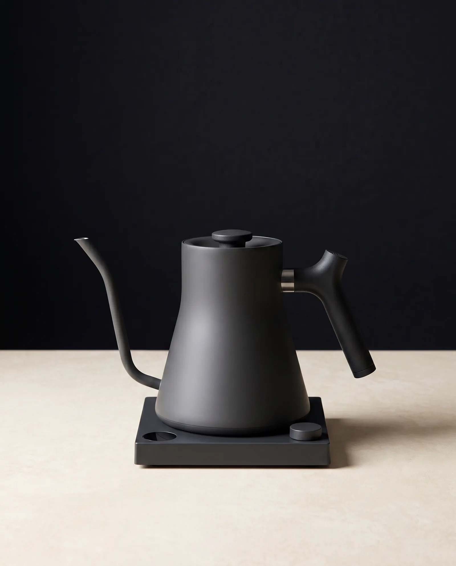 The Precision Gooseneck Pour Over Kettle on its weighted base — studio specimen